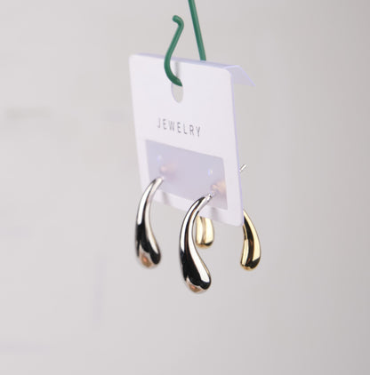 Gold And Silver Abstract Lava Earrings, Drip-Shaped Modern Hoops, Fluid Art-Inspired Design For Bold Women In Brass